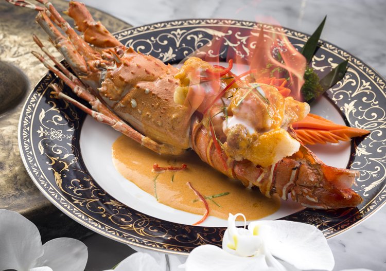 Signature dish: Mung korn lui fai (Flambéed Phuket lobster served with sweet red curry sauce)